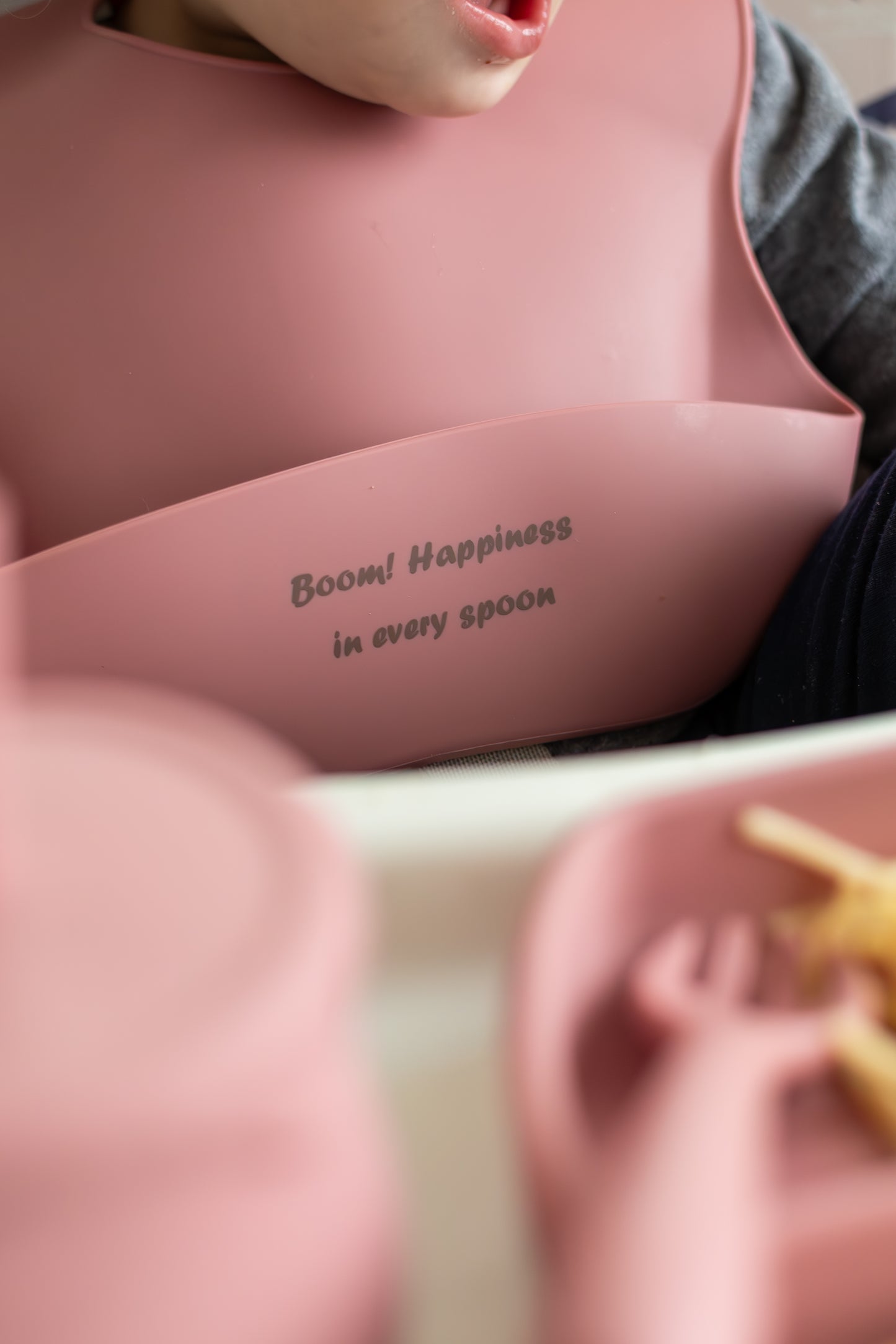 Silicone bib for baby  weaning “Boom! Happiness in every spoon”