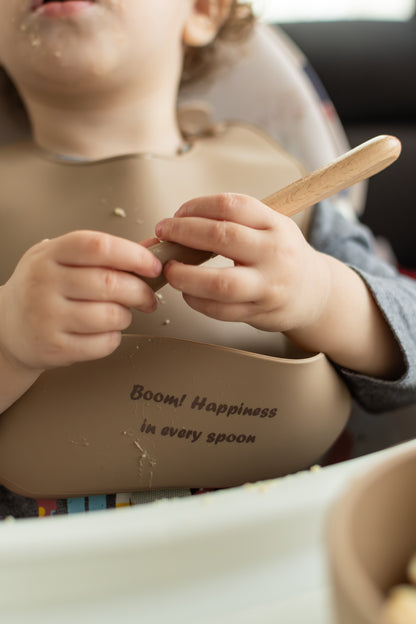 Silicone bib for baby  weaning “Boom! Happiness in every spoon”